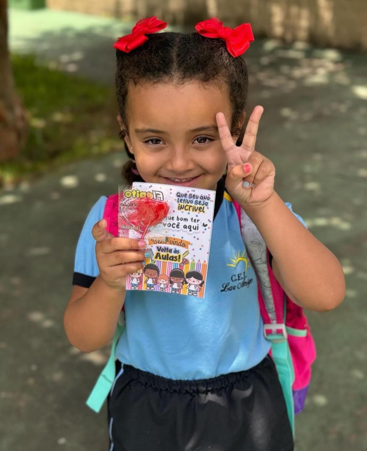 Person placing task list card into walnut card holder next to felt carrying case on leather desk pad.
